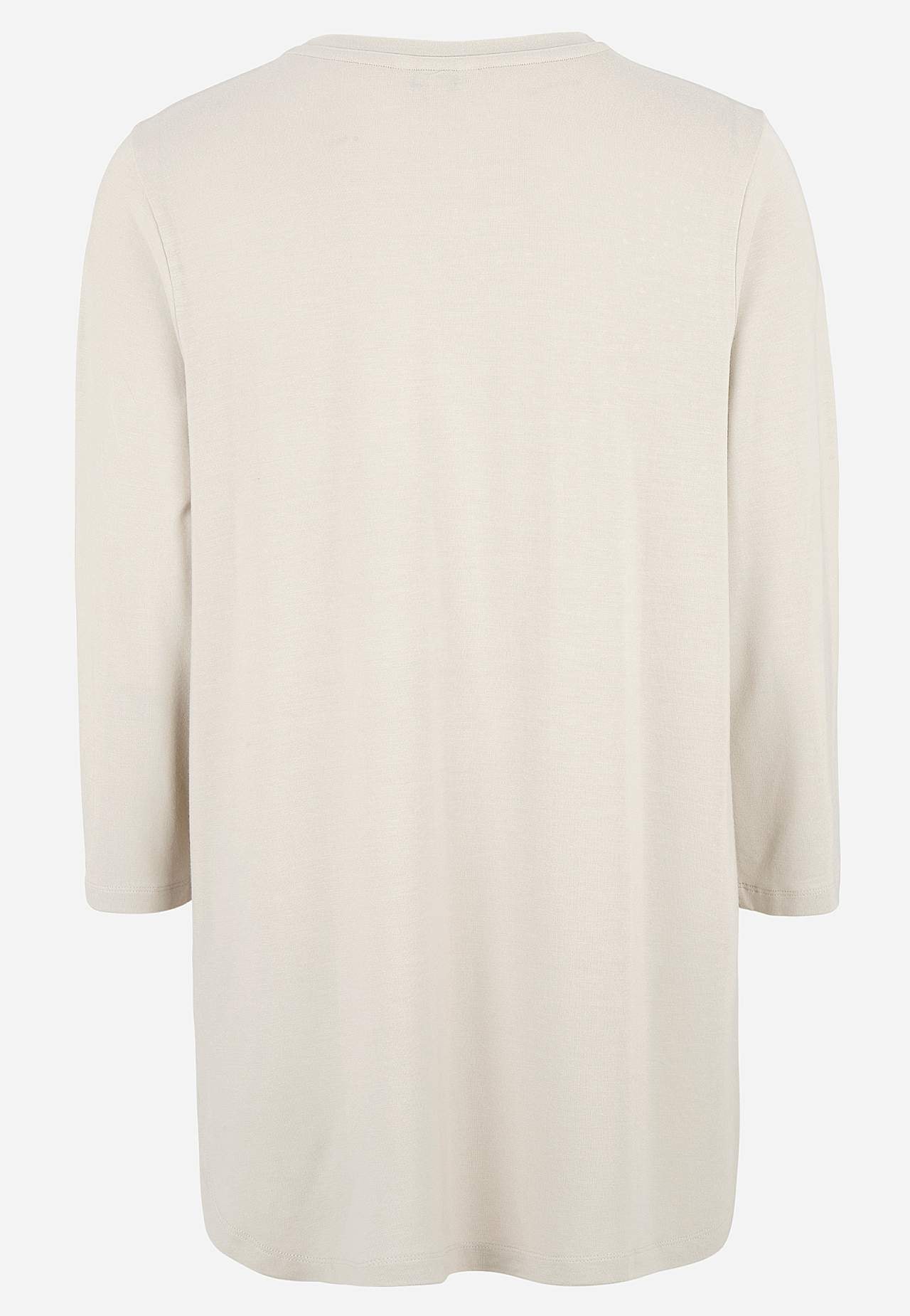 Ljusbeige trikåtunika med strassdetaljer