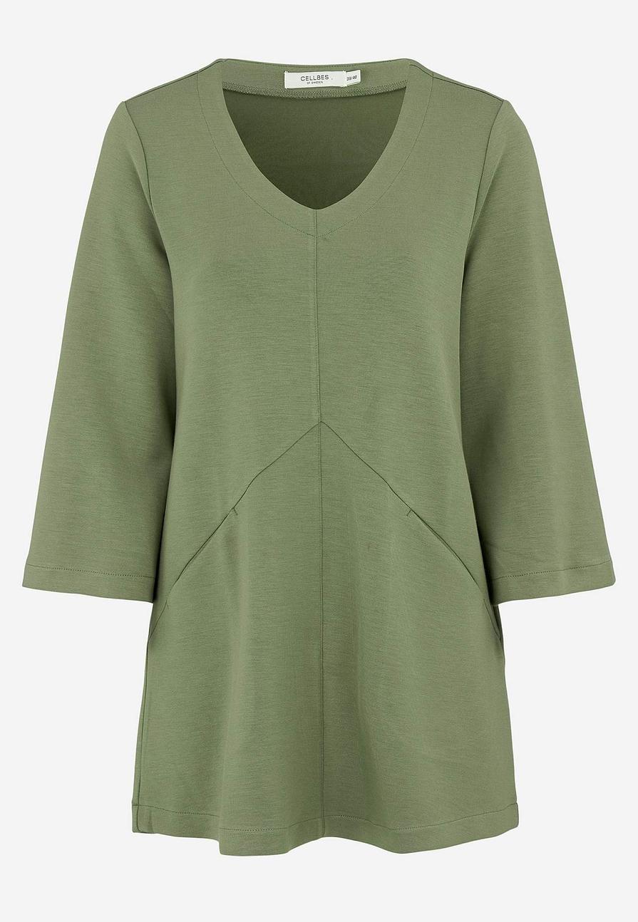 Elegant supermjuk trikåtunika med fickor