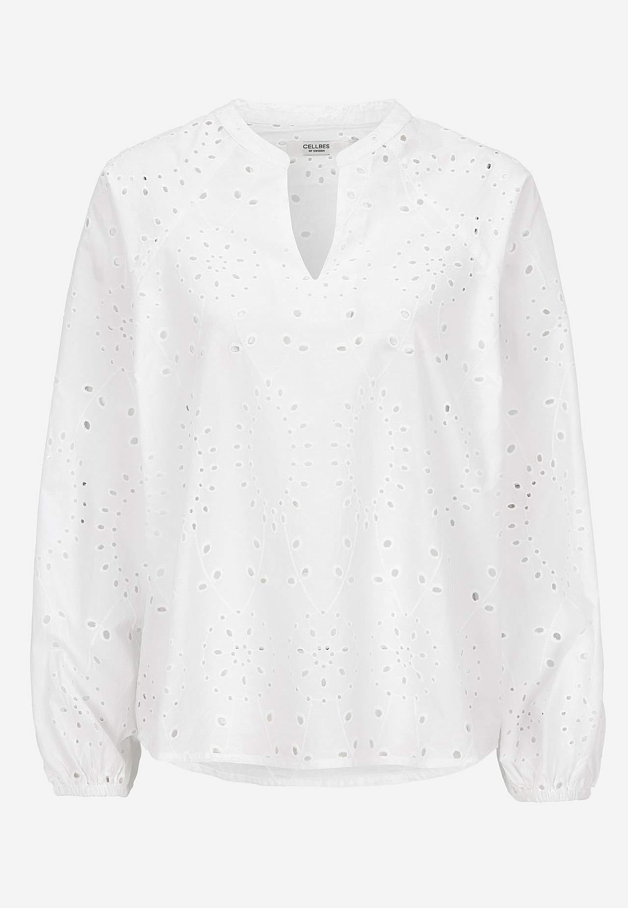 Vit blus med elegant brodyr
