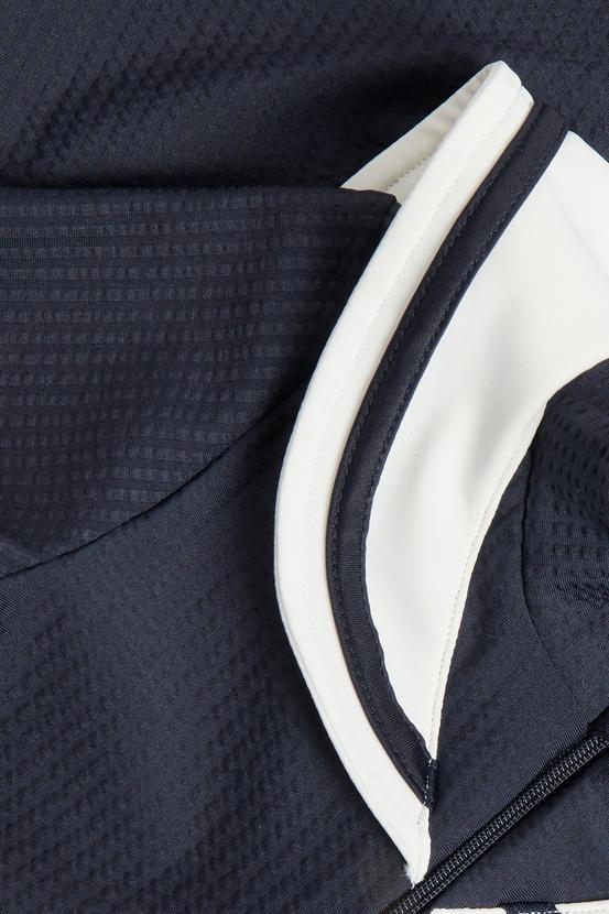 Mörkblå UV-dräkt med sjömanskrage