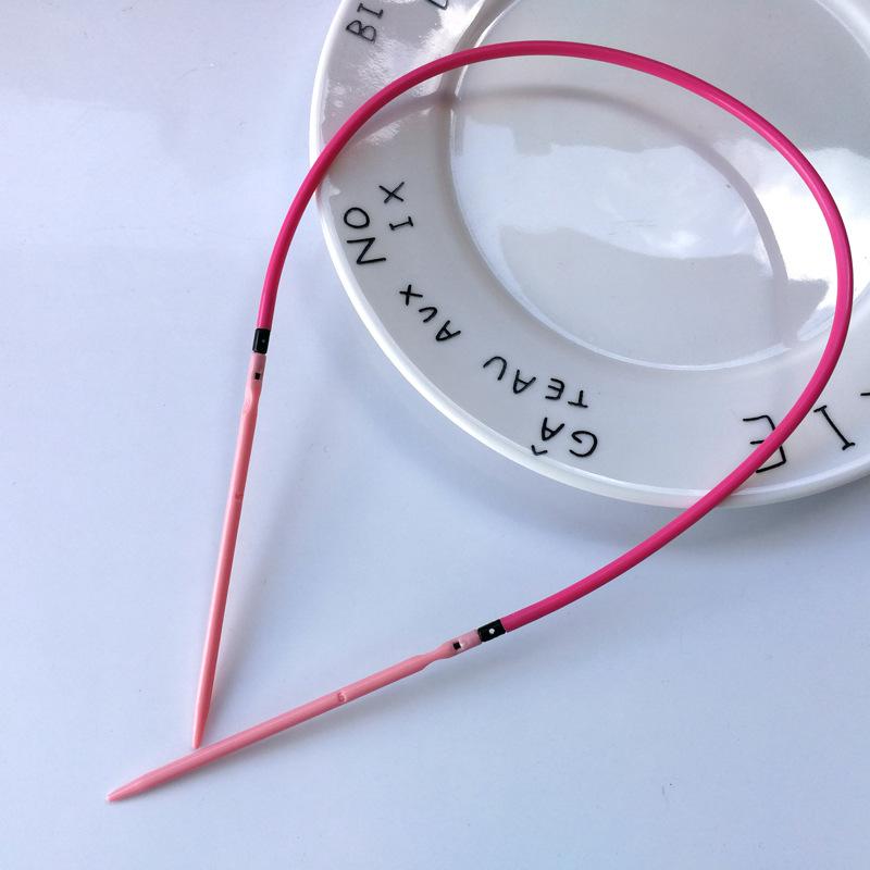 N101 Set med 10 färgglada rundstickor i plast