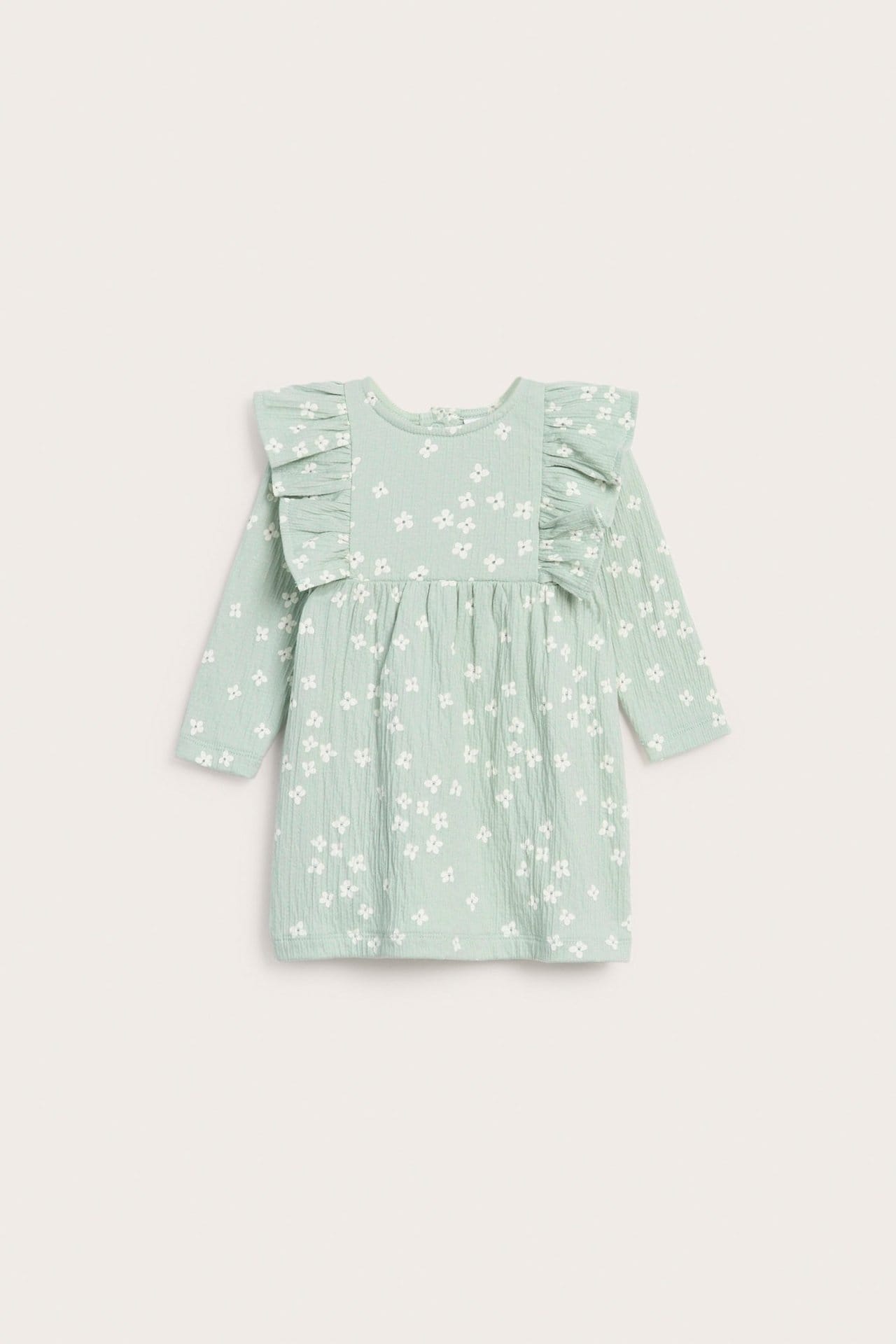 Ljusgrön babyklänning med volang