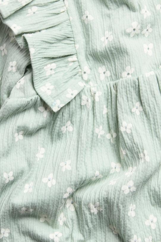 Ljusgrön babyklänning med volang