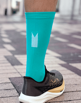 3 för 2 på turkosa löparstrumpor hos Helsingborg Marathon