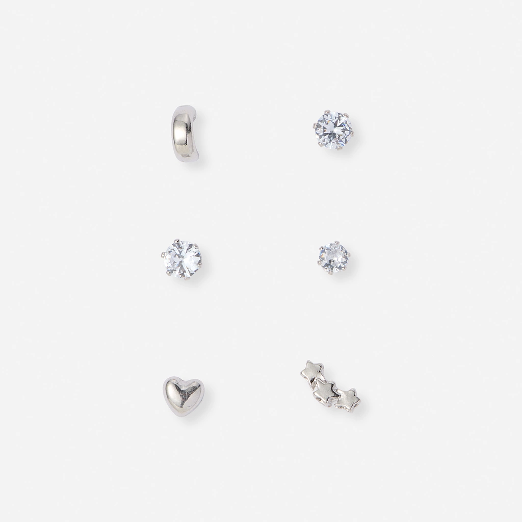 6 silverfärgade studs med olika motiv