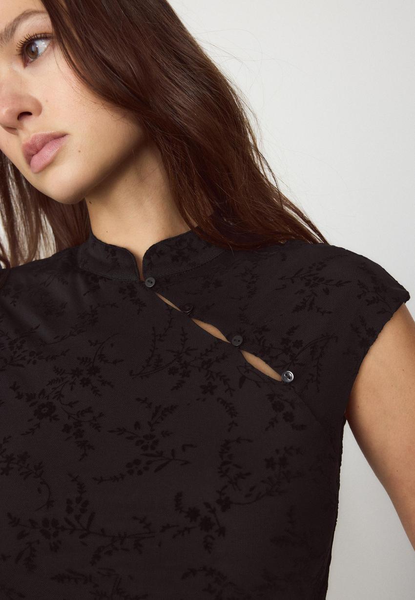 Flockad qipao-stil tröja för kvinnor