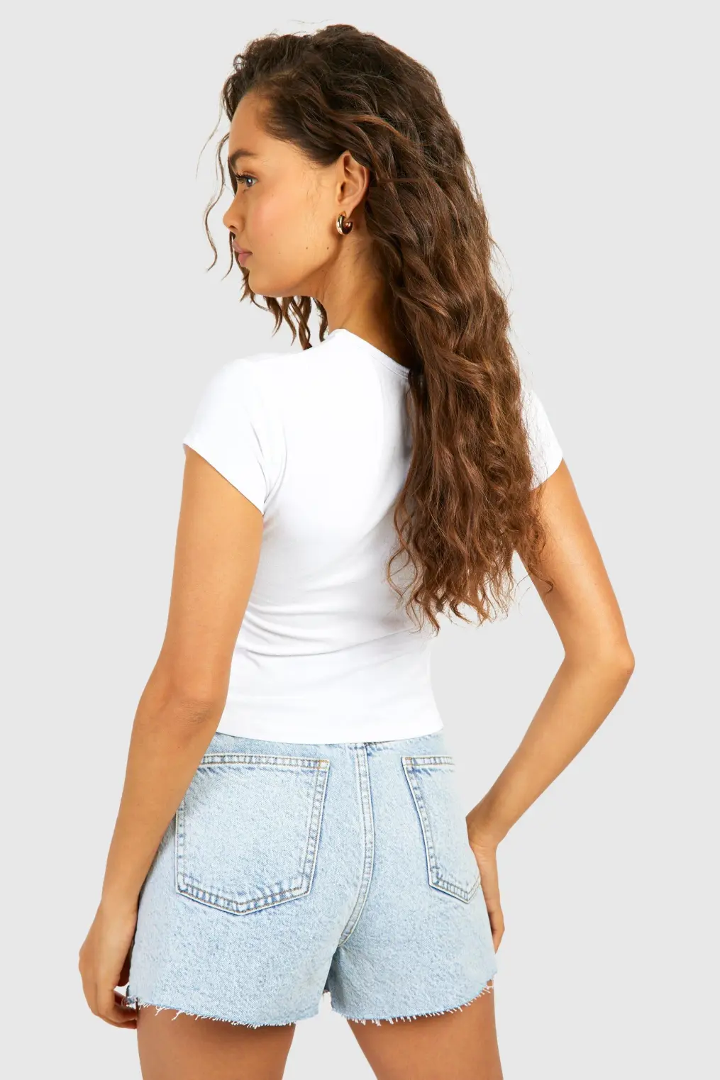 Vit blommig baby-T-shirt med kepsärm