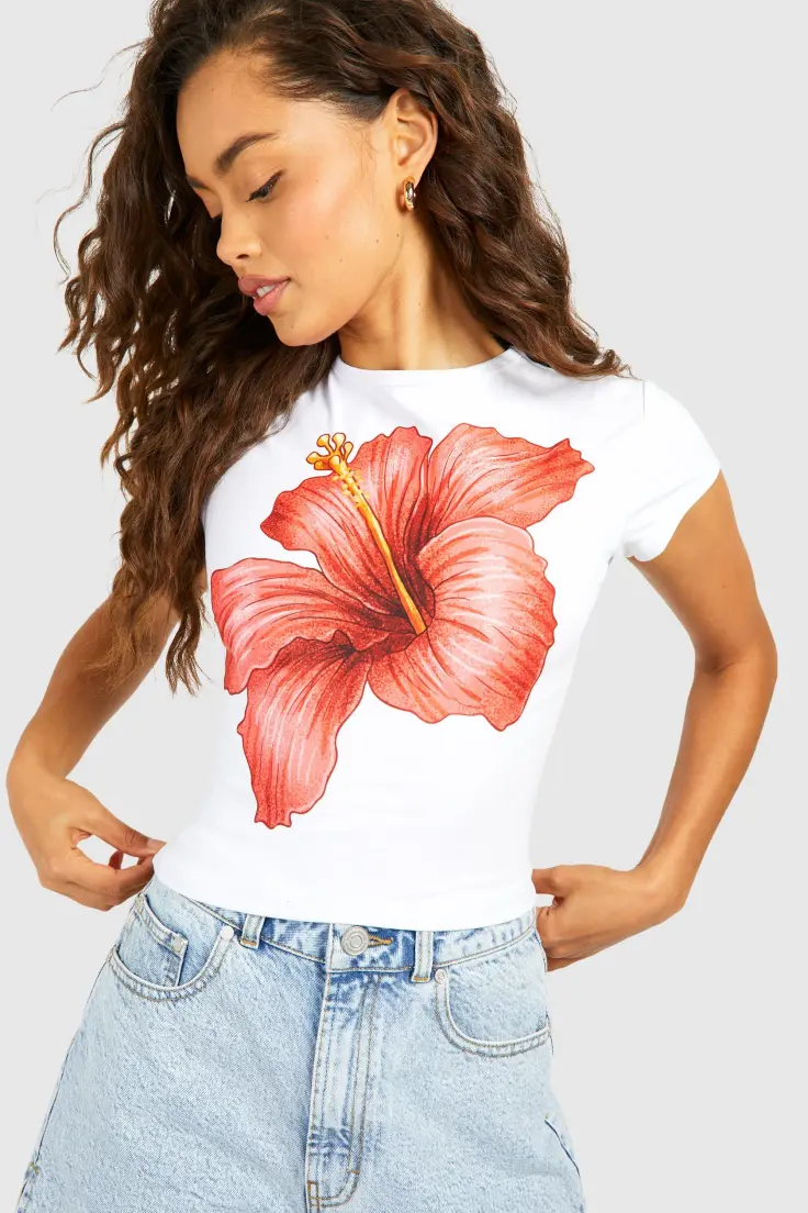 Vit blommig baby-T-shirt med kepsärm