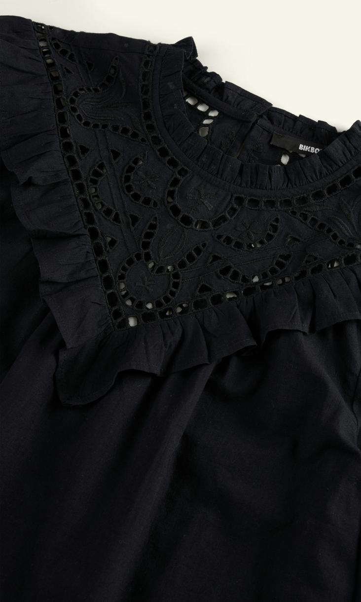 Svart Luna blus med eleganta volanger