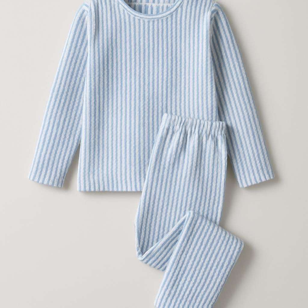 Randiga blå pyjamas i bäckebölja