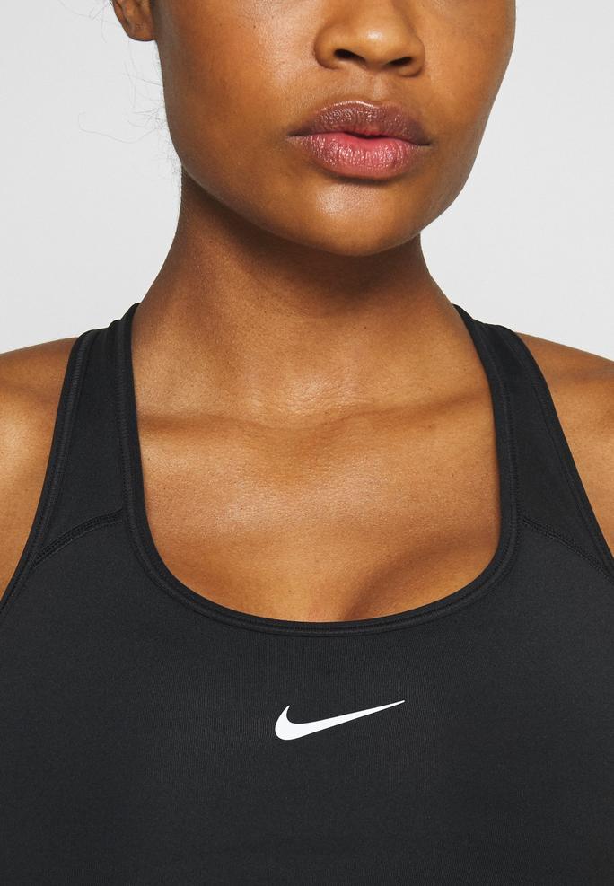 Nike Performance svart sport-bh hos Lounge by Zalando