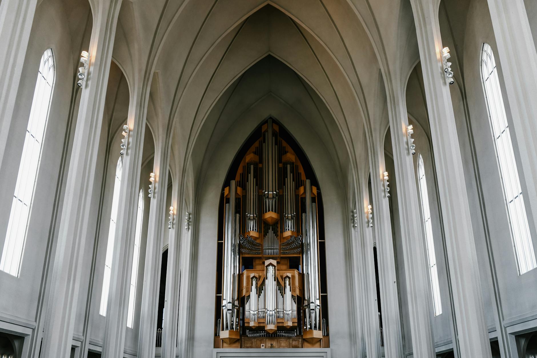 Majestic view of the Hallgrimskirkja Church interior featuring a grand organ.