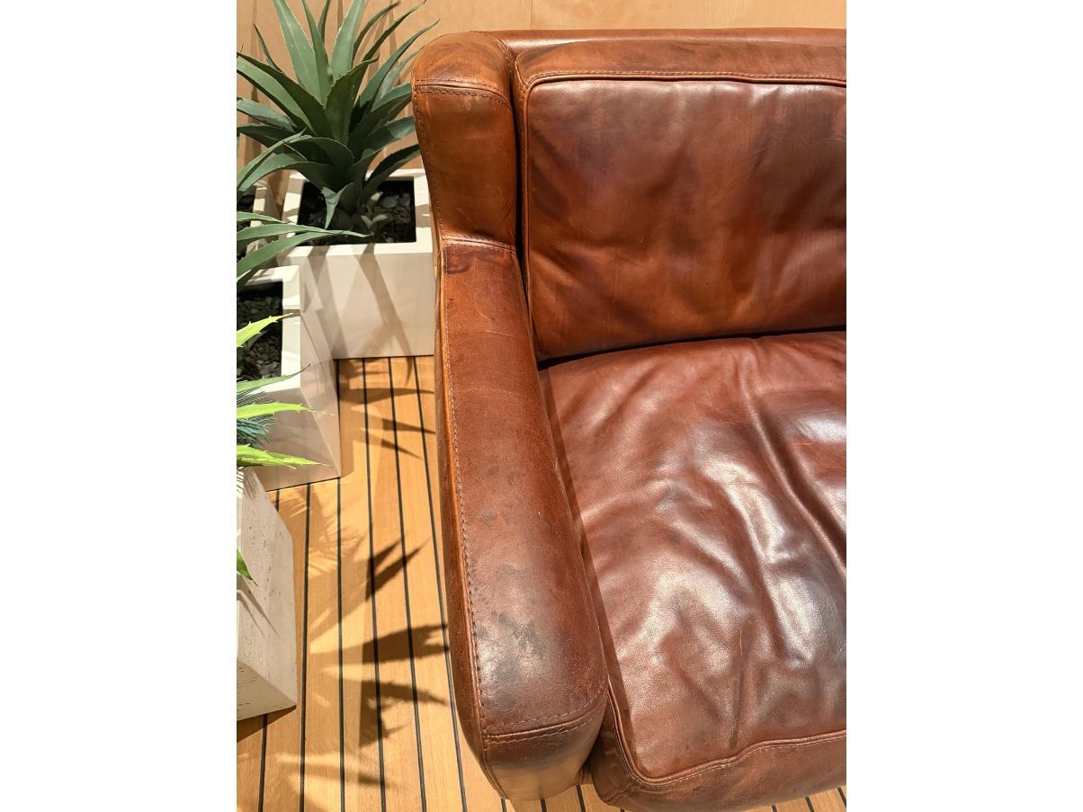 Brown leather armchair Defects