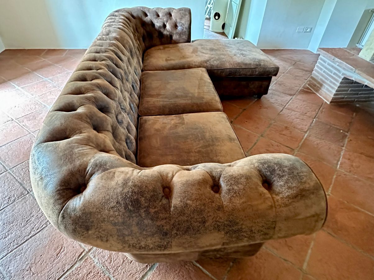 Vintage brown leather corner sofa Side