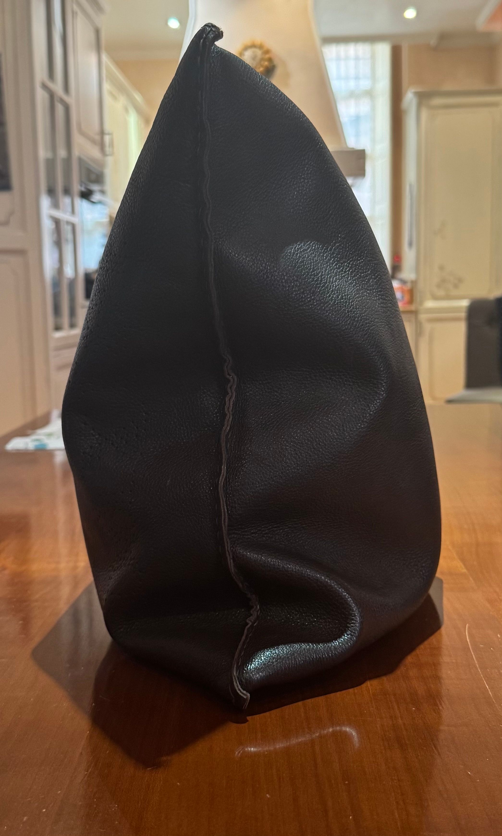 Pair of black leather cushions Side