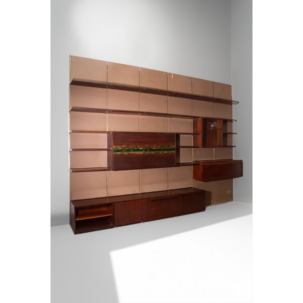 Wall bookcase with Pomodoro artwork by Osvaldo Borsani, Tecno image