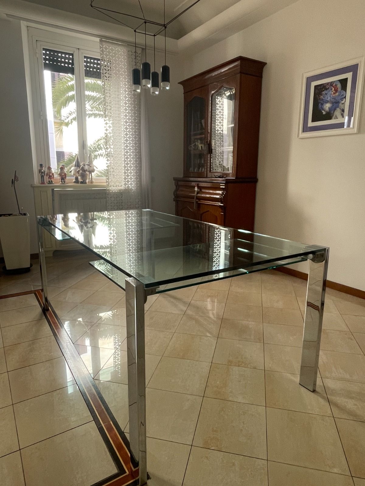 Livingstone extendable dining table in tempered glass 12