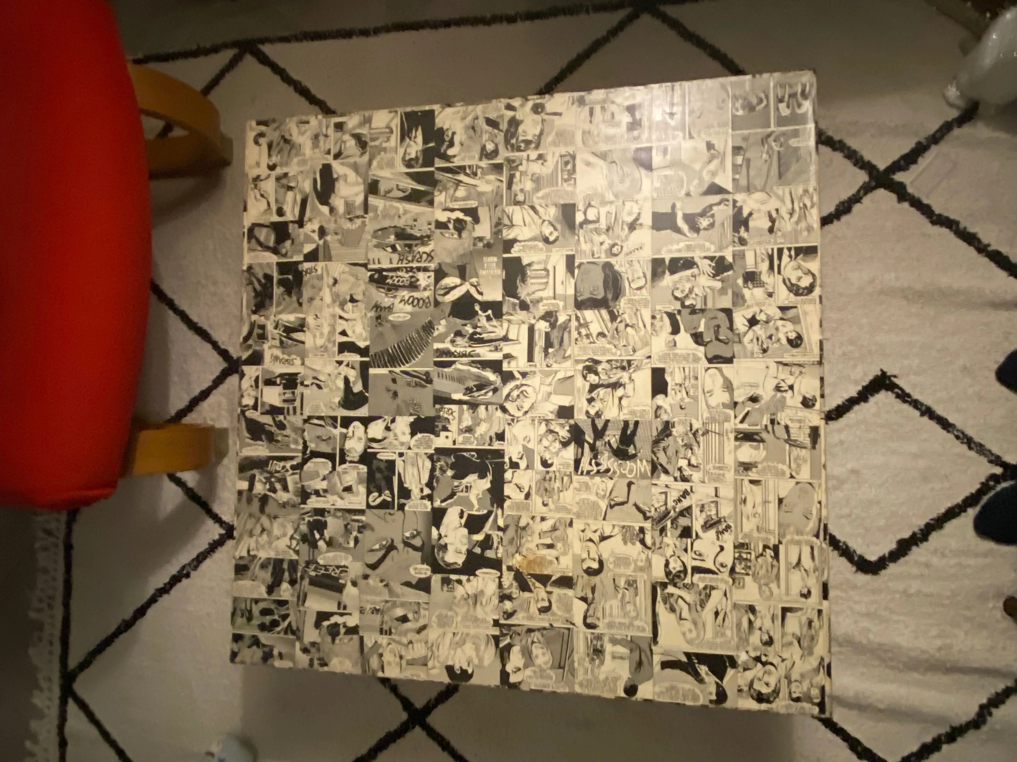 Square coffee table with comics, 1