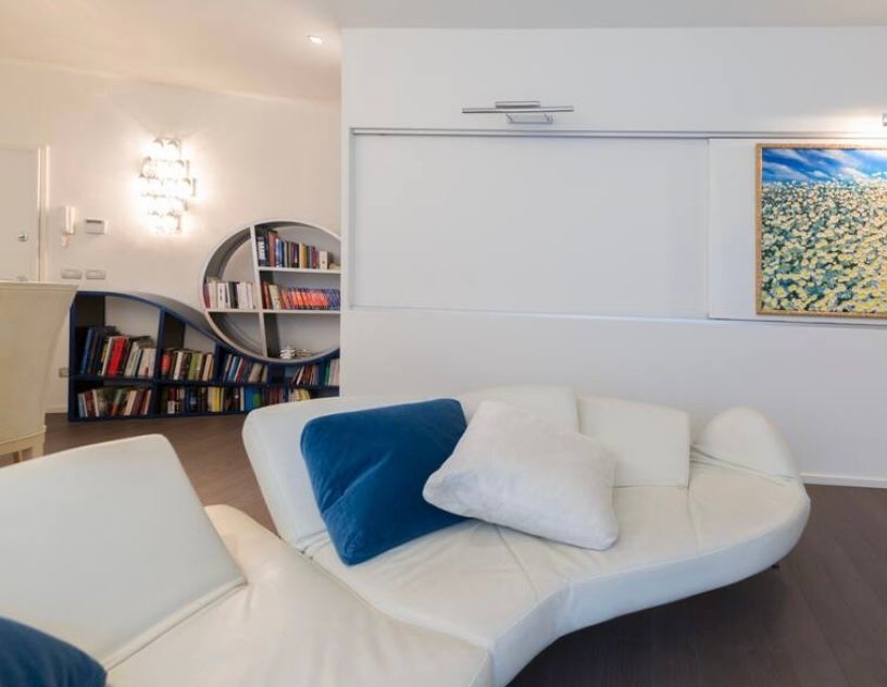 Flap sofa vintage in white leather by Francesco Binfaré Front