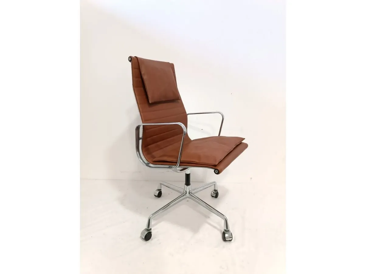 Brown Aluminum presidential armchair by Charles and Ray Eames, Vitra image