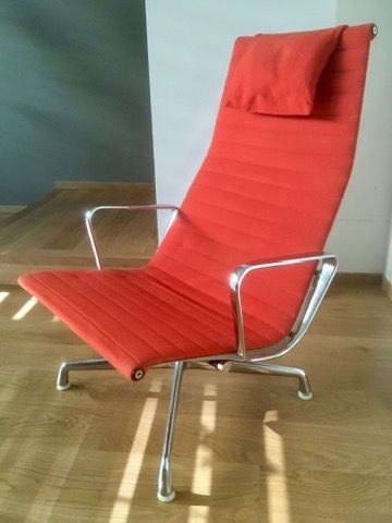 Red EA124 Lounge Chair by Charles and Ray Eames Front