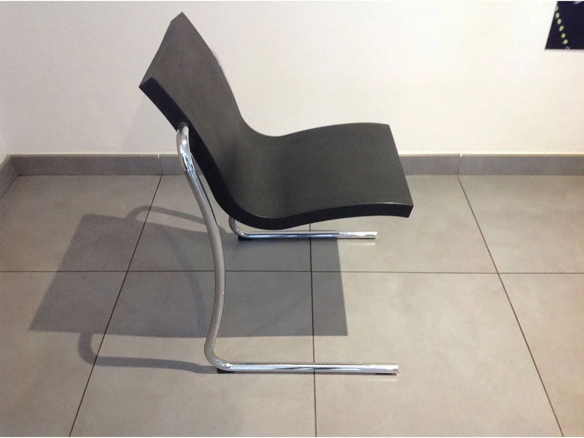 Set of 4 Magic Chair steel and polyurethane (black) chairs