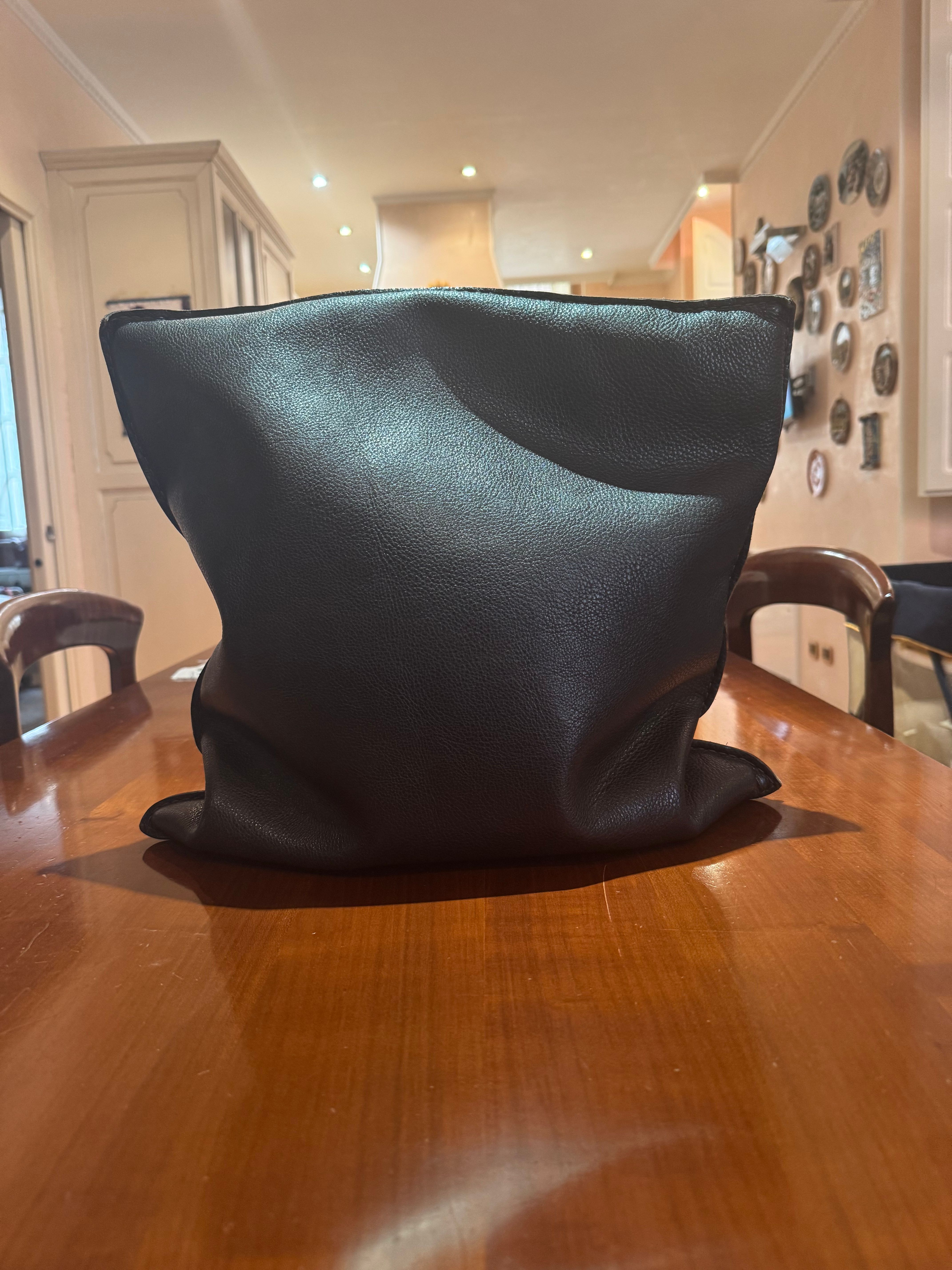 Pair of black leather cushions Details
