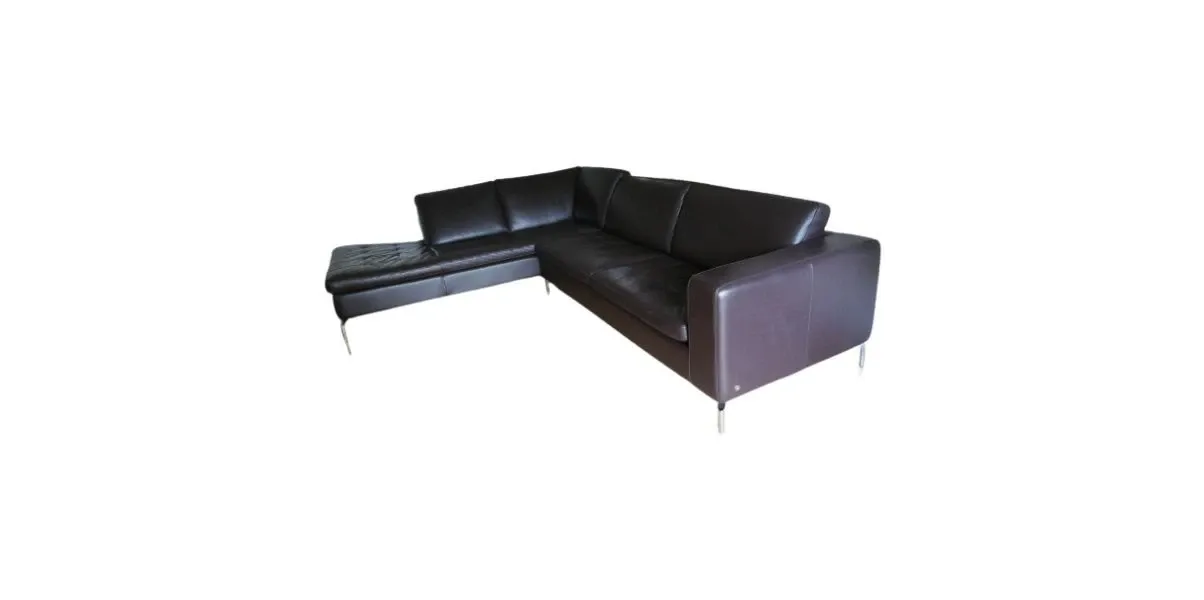 Corner sofa in dark brown textured leather, Natuzzi image