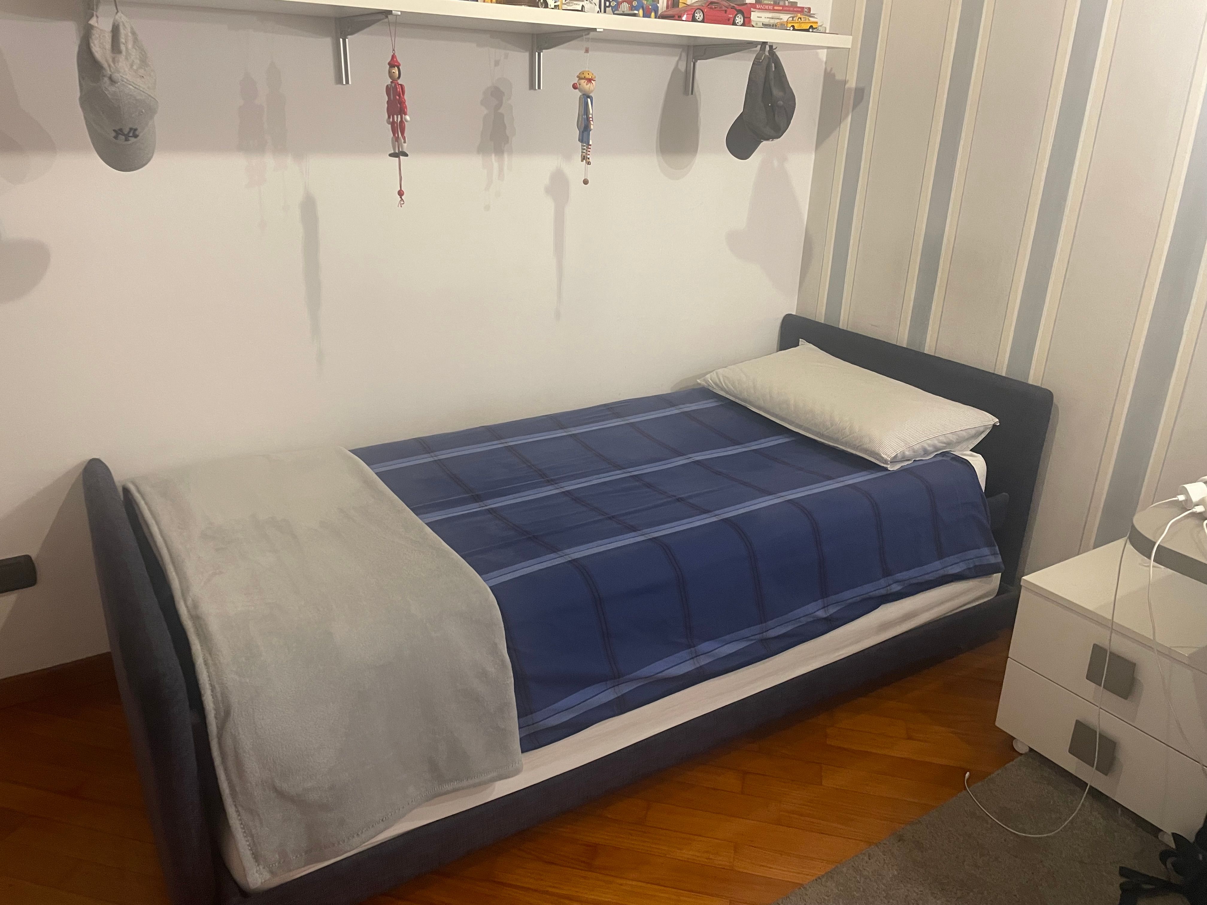 Single bed Duetto in blue fabric, Flou  Side
