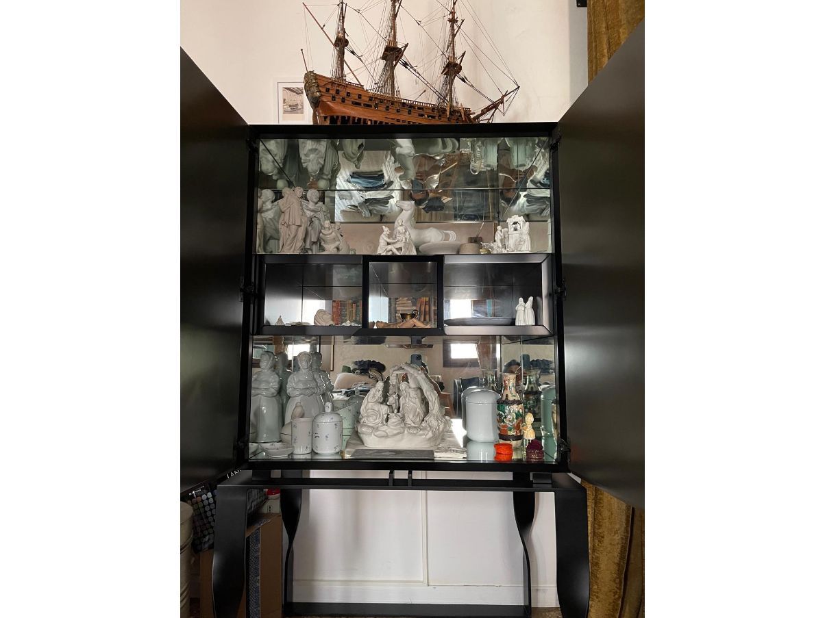 Bricola cabinet with internal wooden mirrors Front