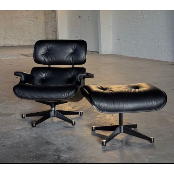 Eames Lounge Chair armchair and ottoman set by Charles & Ray Eames, Vitra image