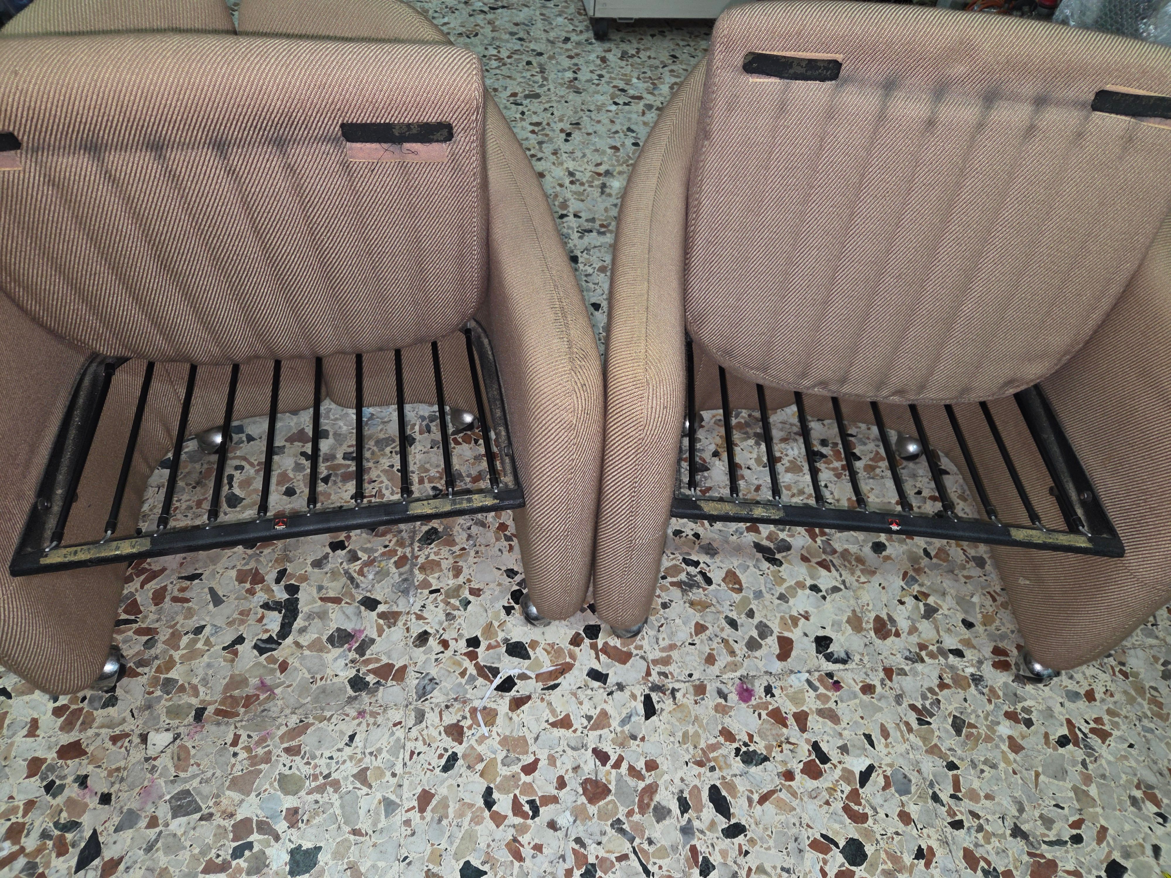 Pair of vintage PS142 armchairs by Eugenio Gerli Front