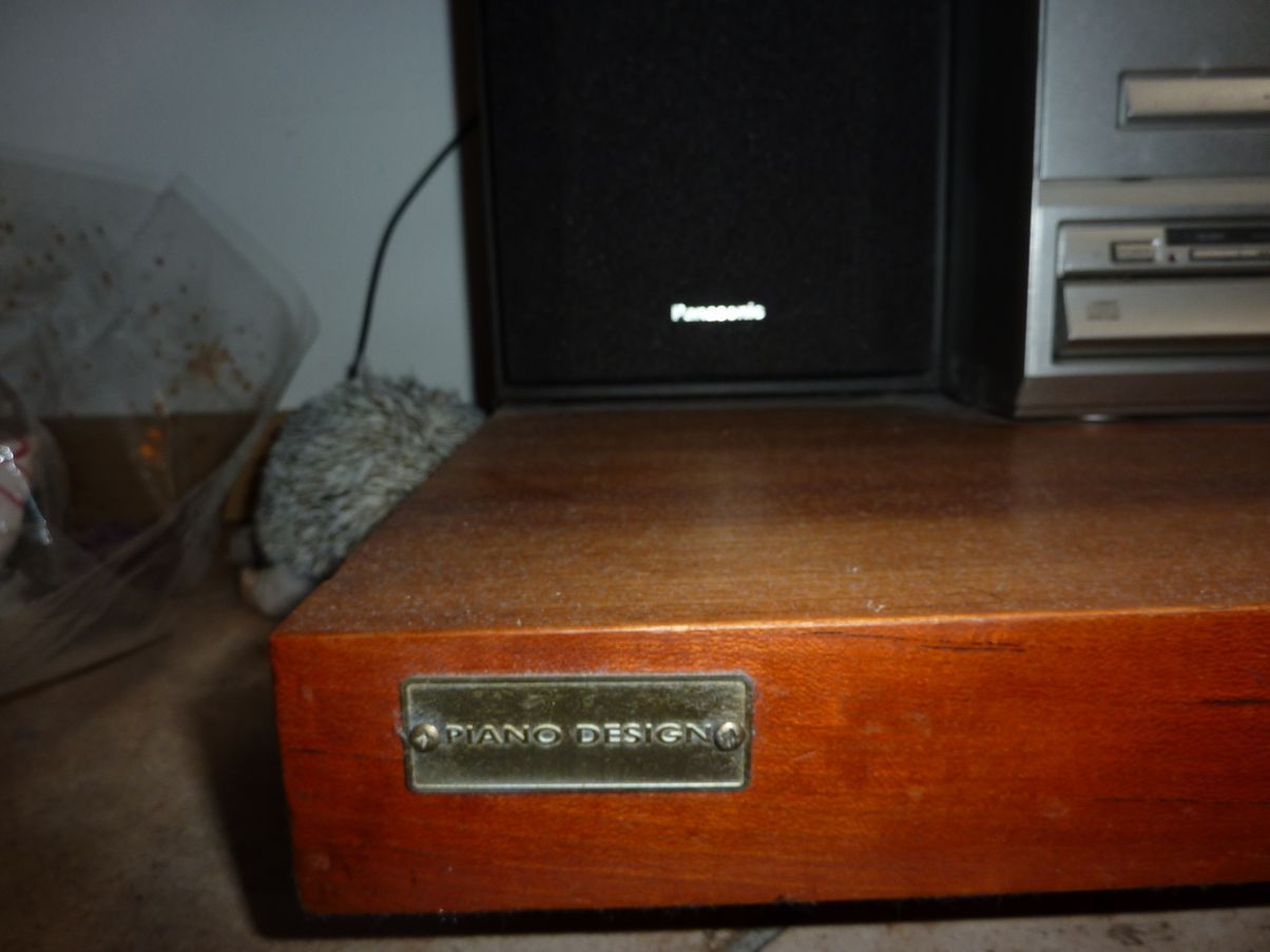 Libreria vintage in legno di ciliegio e acciaio Brand