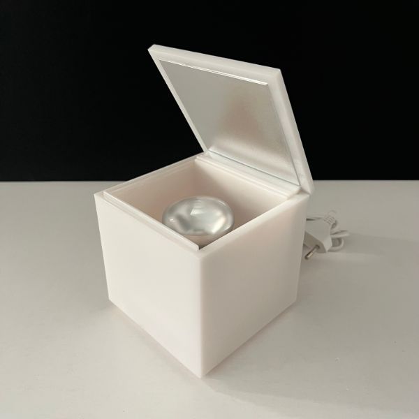 White opalescent Cuboluce bedside lamp by Franco Bettonica and Mario Melocchi (90s), Cini&Nils image