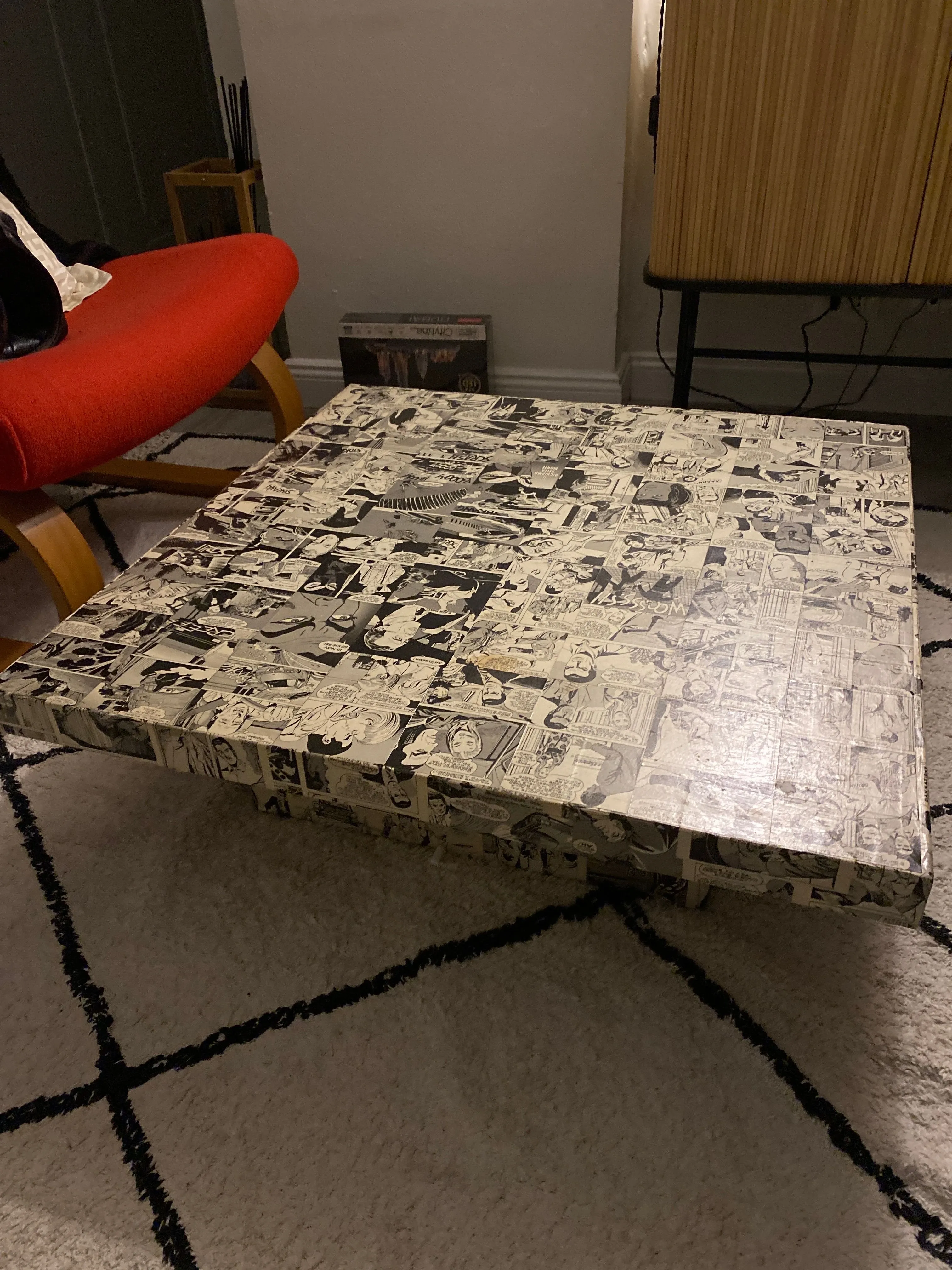 Square coffee table with comics, 2