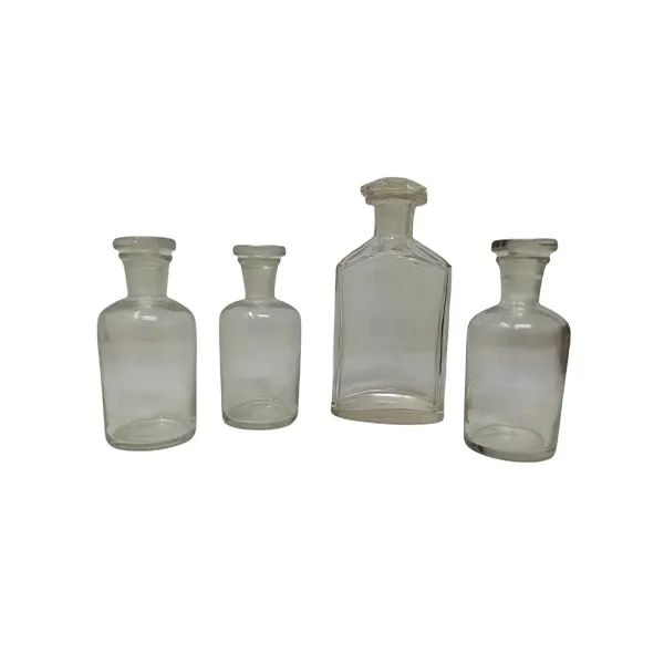 Set 4 bottiglie vintage da farmacia in vetro (trasparente) 