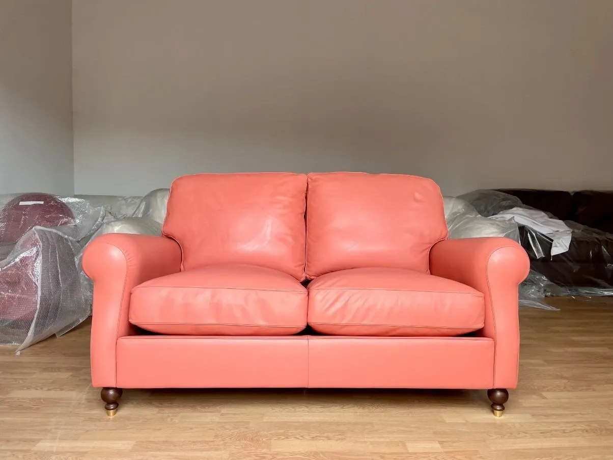 Divano posti in pelle rosa, Poltrona Frau Deesup