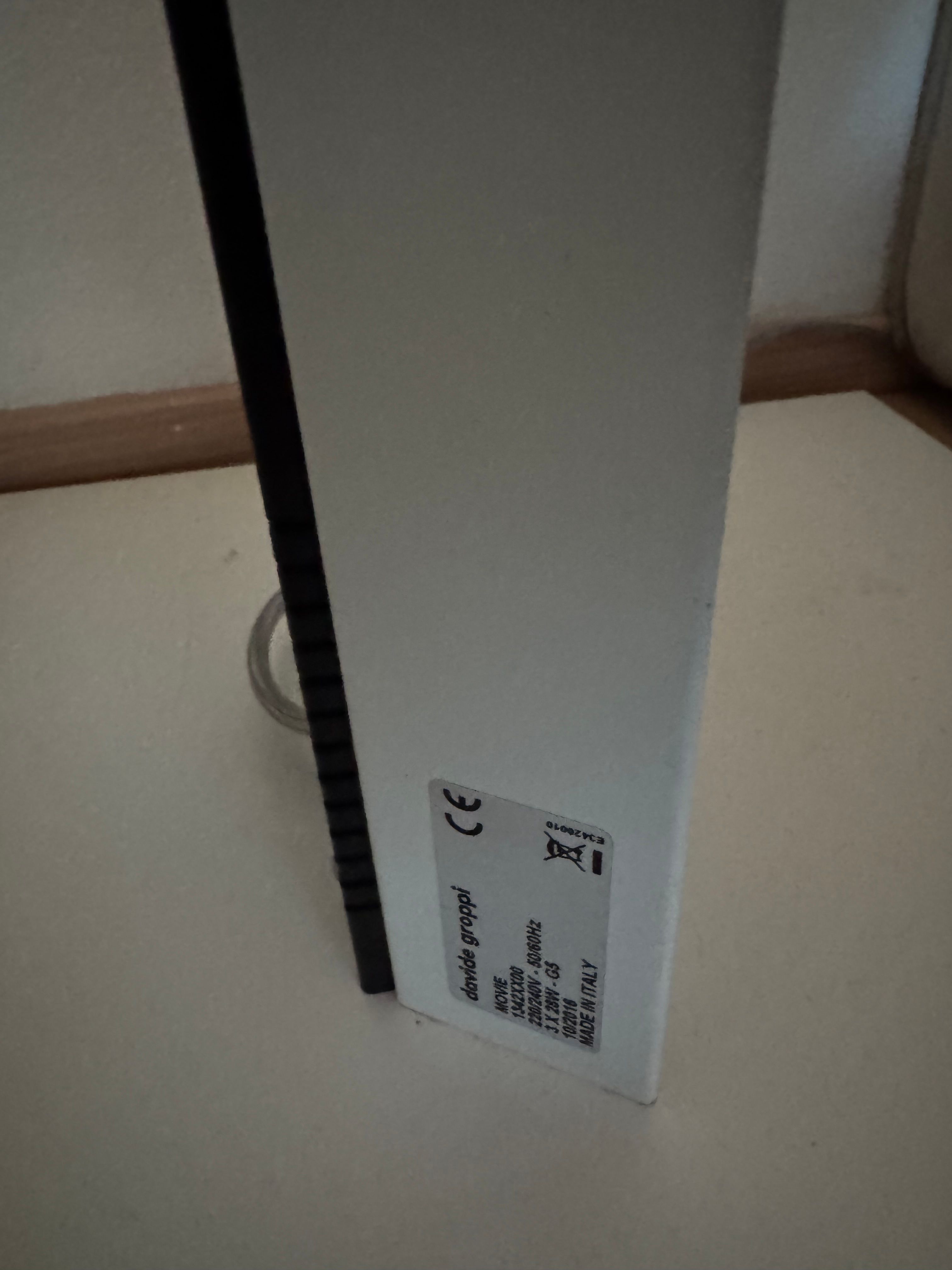 Movie floor lamp in white metal Brand