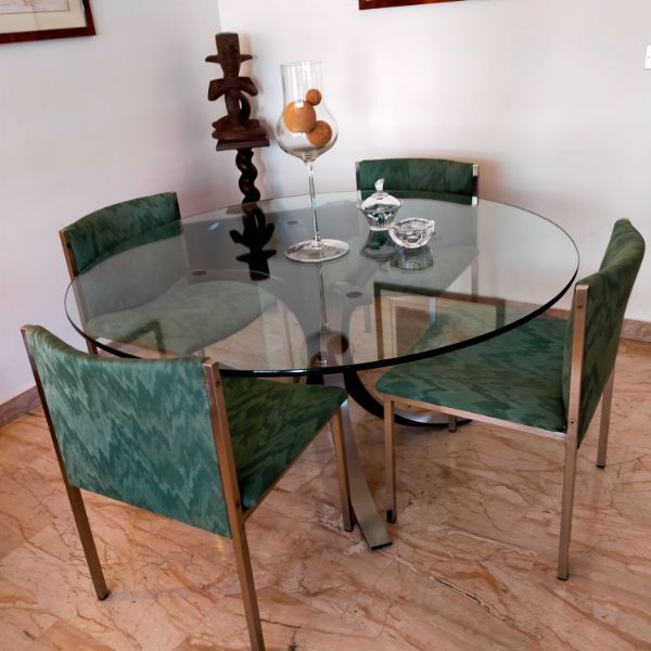 Set of Nomos T69 crystal table and 4 upholstered chairs, Tecno image