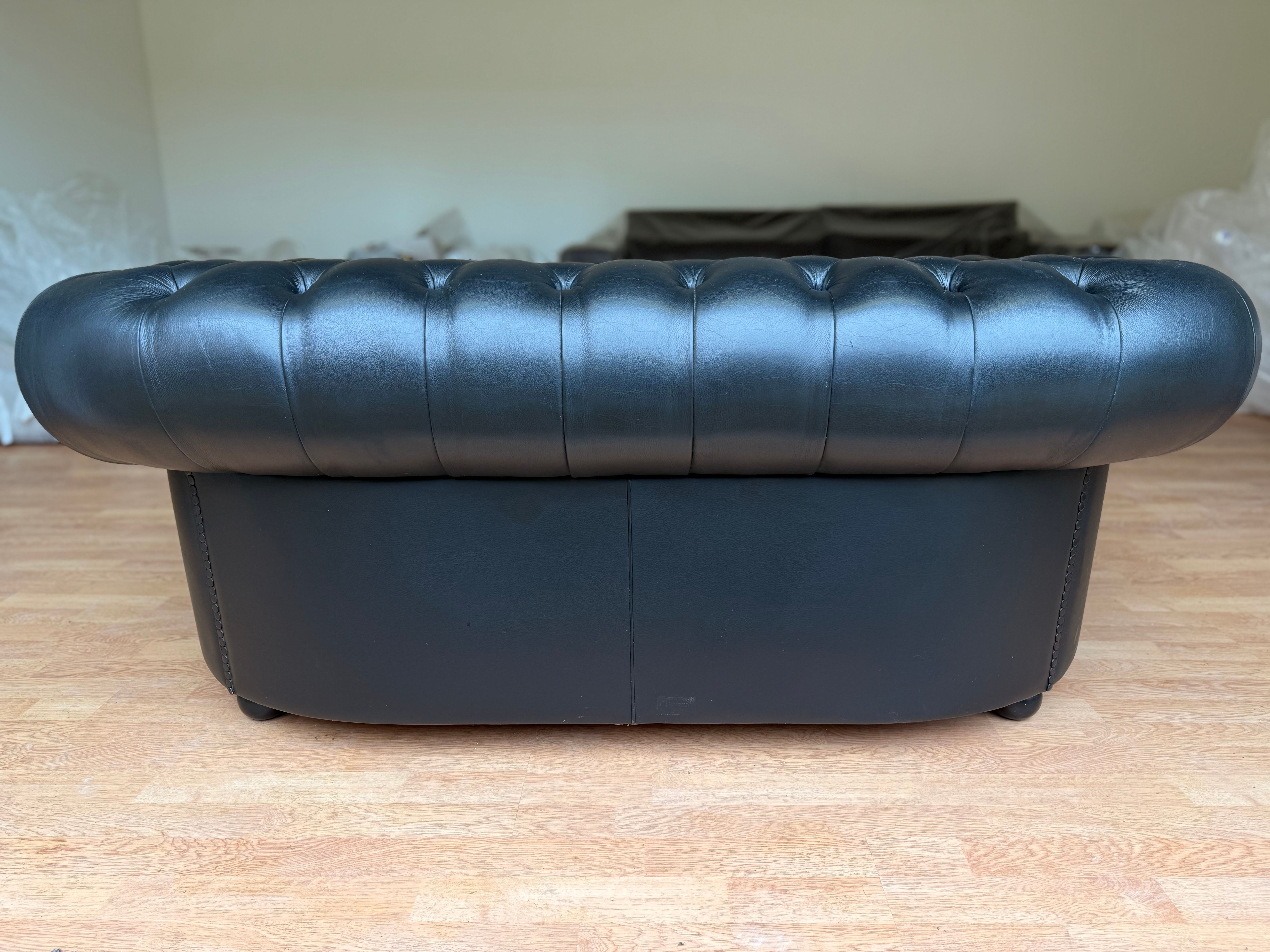 Chester 2 seater sofa upholstered in black leather by Renzo Frau, Poltrona Frau Defects