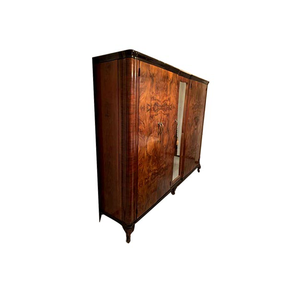 Vintage wooden wardrobe decorated with mirror and drawers image