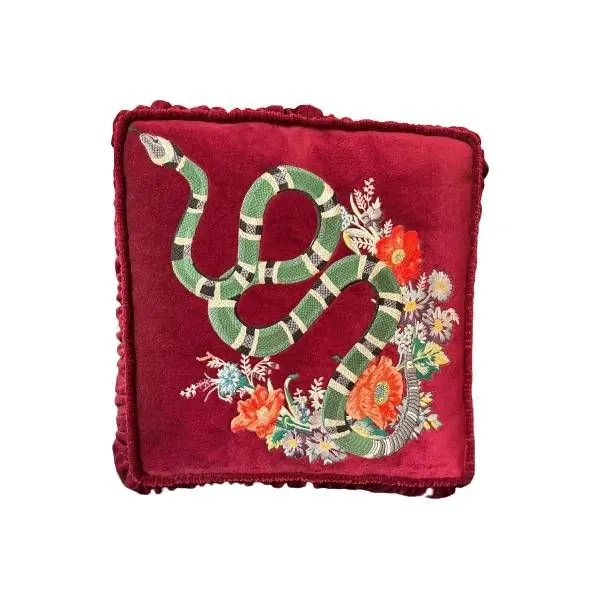 Red velvet cushion with decorations, Gucci image