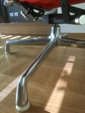 Red EA124 Lounge Chair by Charles and Ray Eames Details