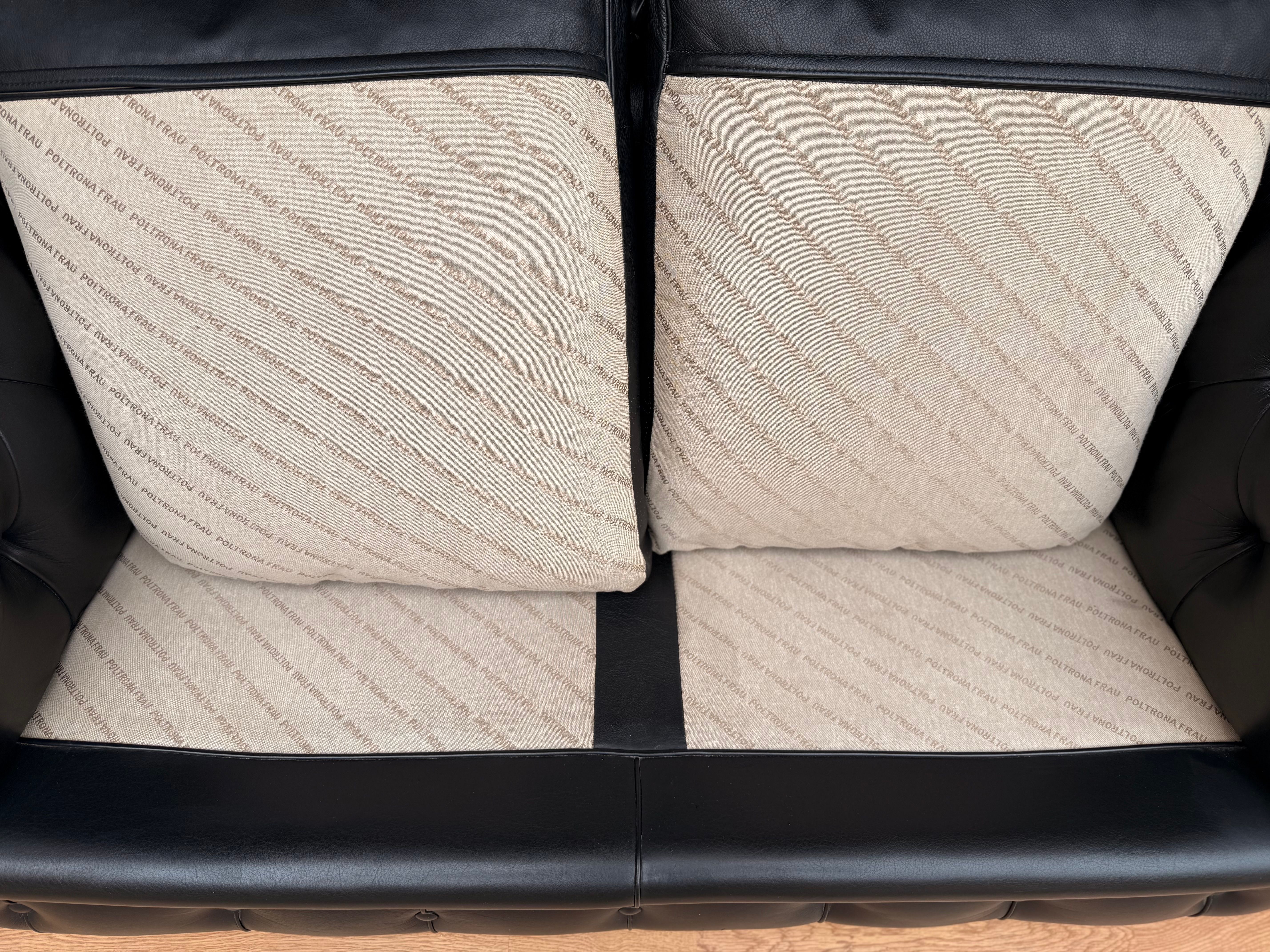 Chester 2 seater sofa upholstered in black leather by Renzo Frau, Poltrona Frau Brand