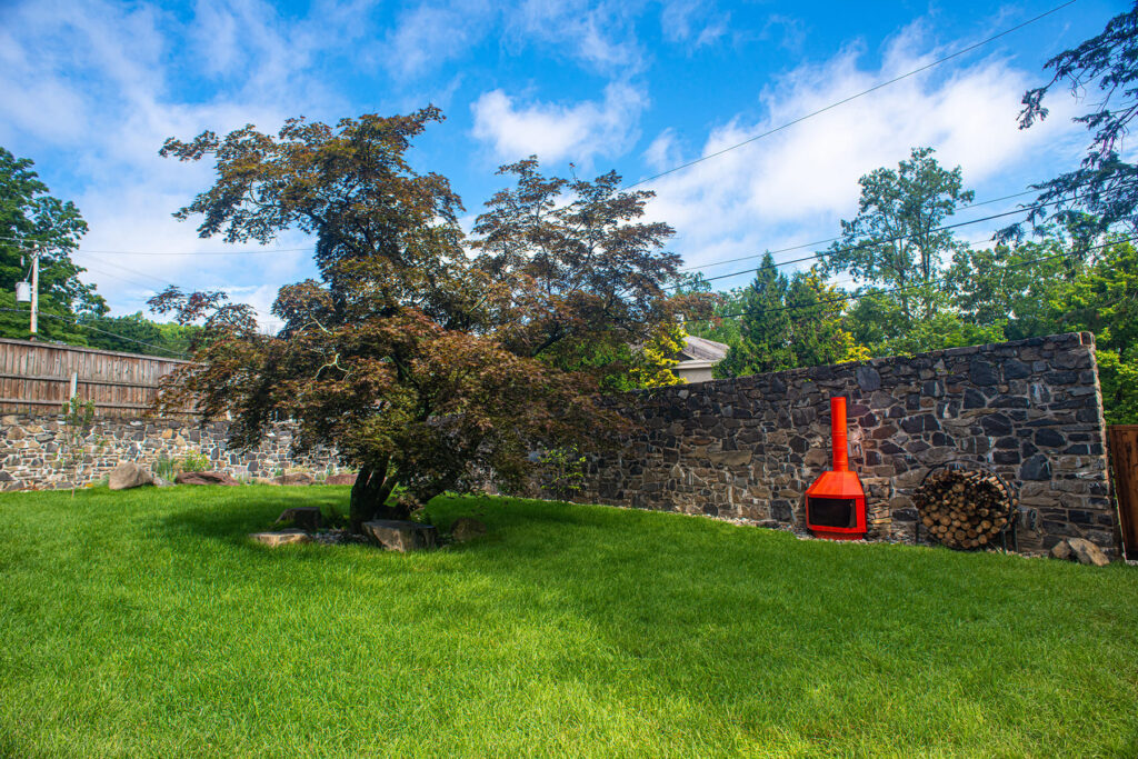 Courtyard and red stove outside Dharma Bums