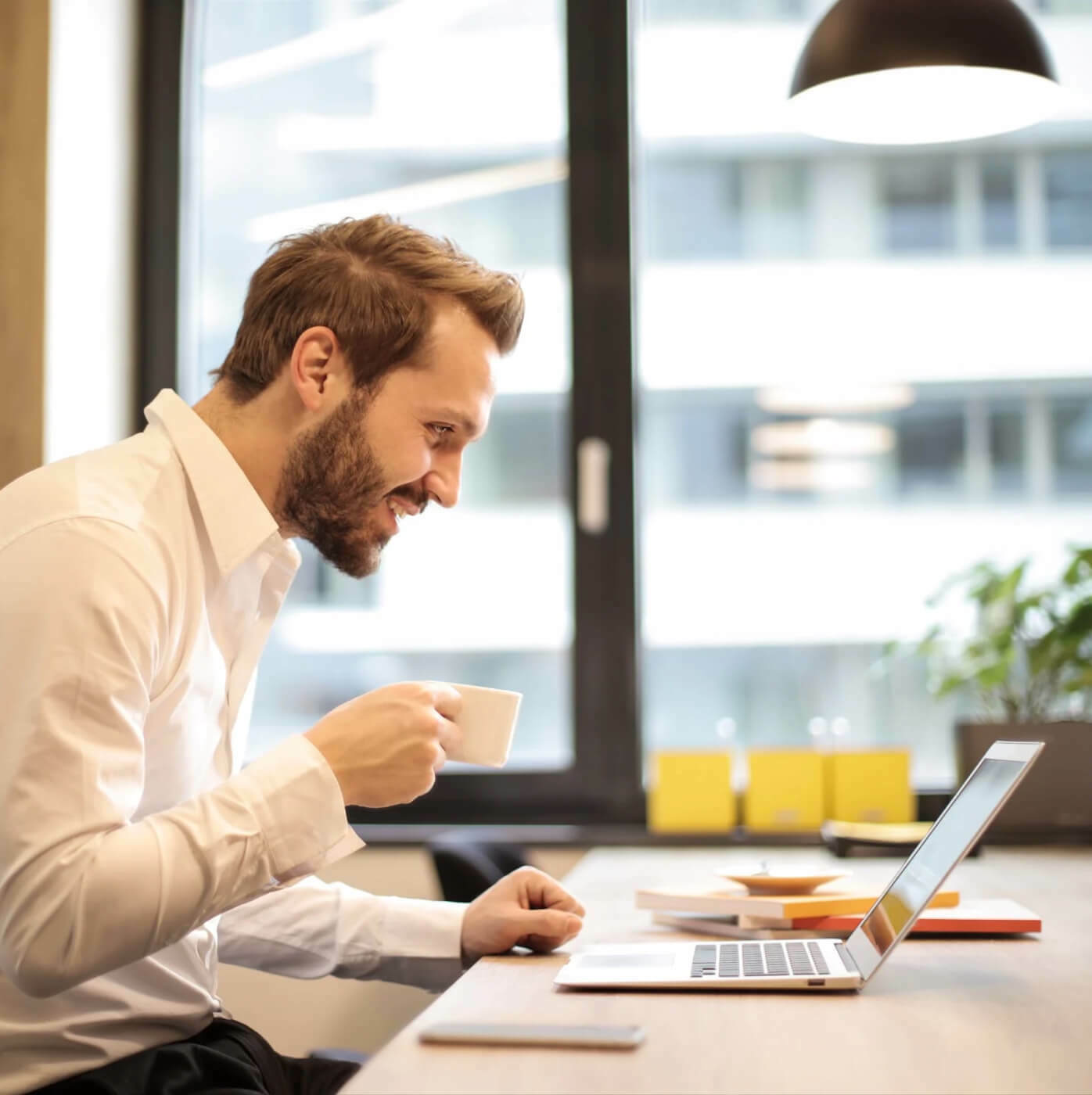 A guy in front of a laptop
