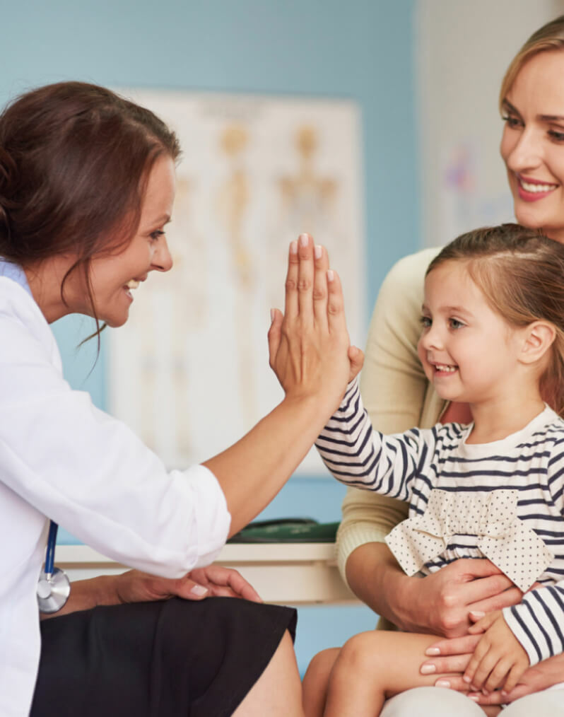 A healthcare professional meeting with a patient