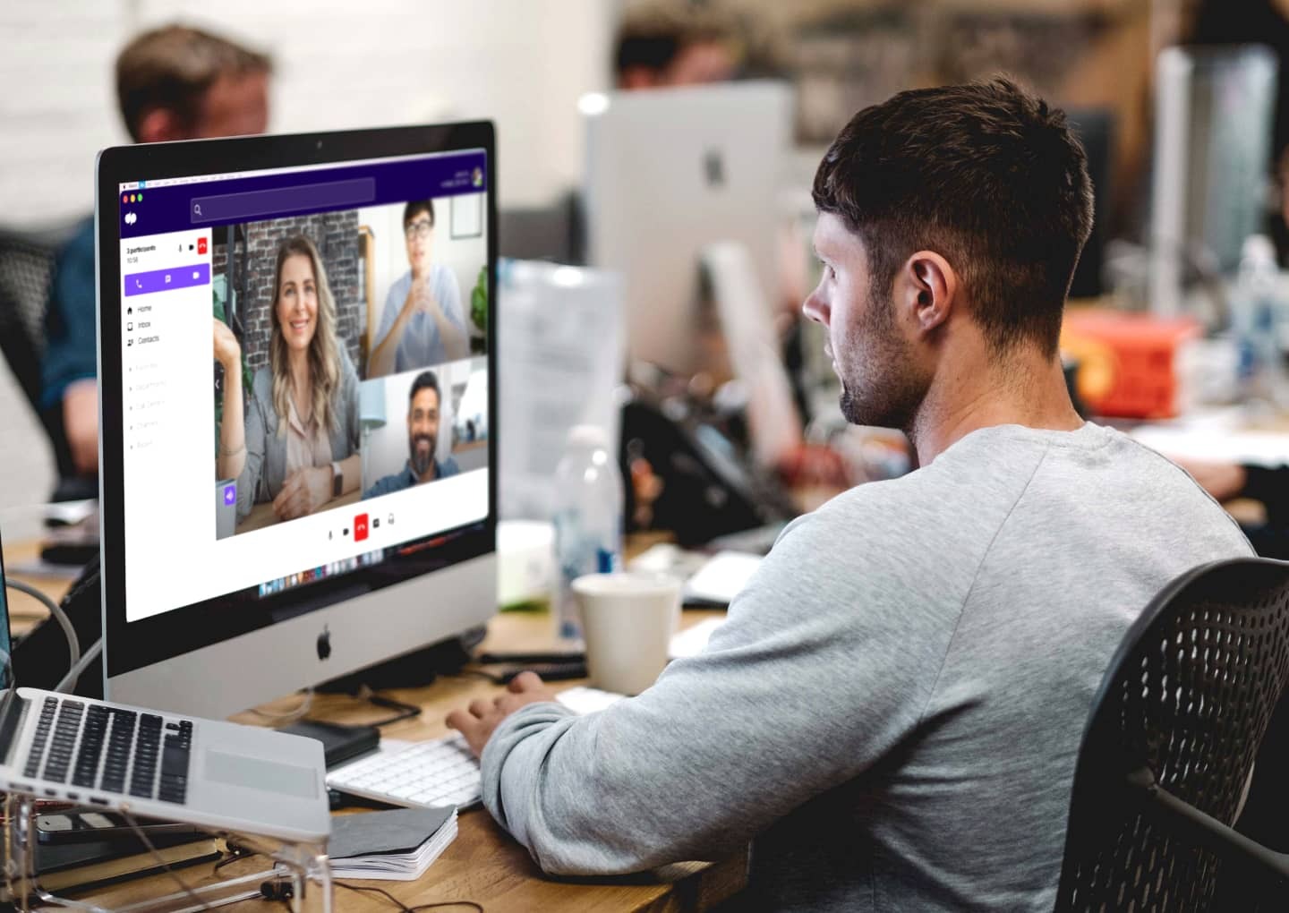 A man in a video meeting