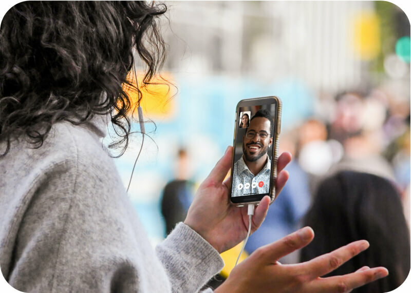 A person holding a mobile phone