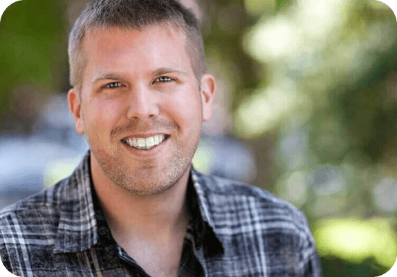 Headshot of Corey Burke, Dialpad's SVP of Telephony Engineering